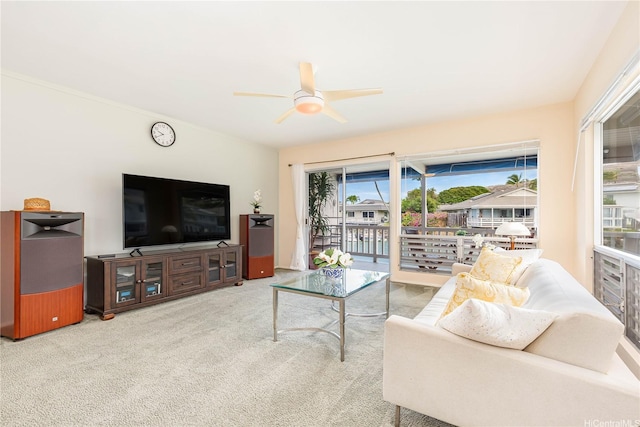 341 Opihikao Pl Unit 422, Honolulu, HI 96825 - carpeted living room featuring ceiling fan