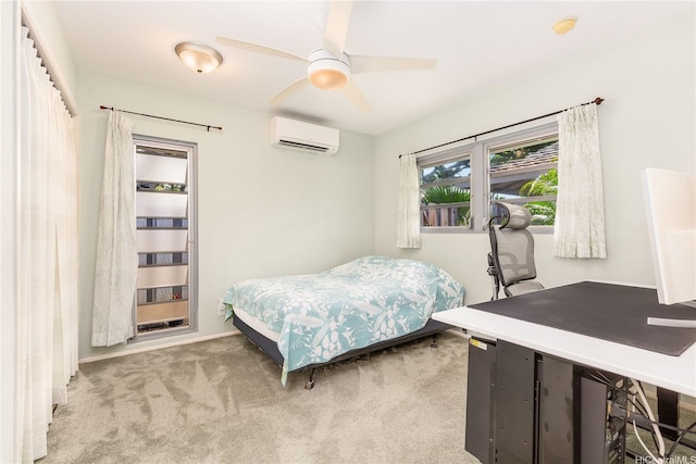 341 Opihikao Pl Unit 422, Honolulu, HI 96825 - bedroom featuring a wall unit AC, light carpet, and a ceiling fan