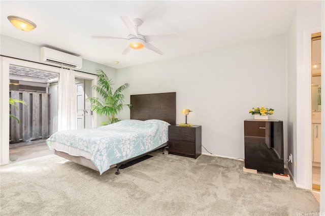 341 Opihikao Pl Unit 422, Honolulu, HI 96825 - bedroom featuring an AC wall unit, carpet floors, access to outside, a ceiling fan, and connected bathroom