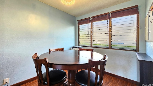 98-441 Kaonohi St Unit 35-3, Aiea, HI 96701 - dining space with wood finished floors, a textured ceiling, and a textured wall