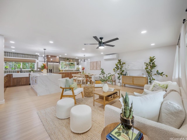 3641 Kumuone St, Honolulu, HI 96822 - living room featuring an AC wall unit, a ceiling fan, recessed lighting, and light wood-type flooring