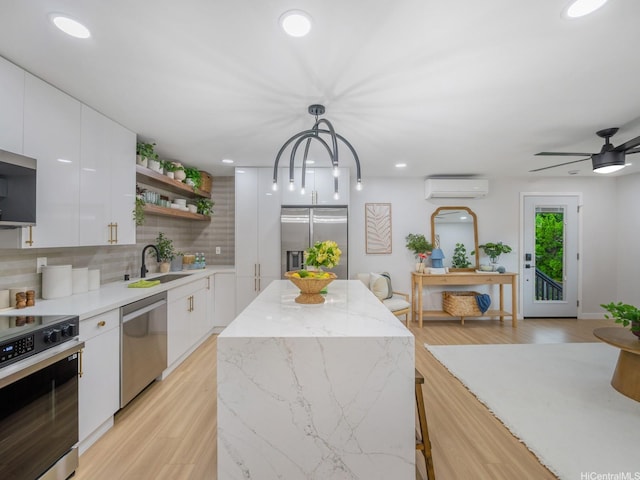 3641 Kumuone St, Honolulu, HI 96822 - kitchen featuring appliances with stainless steel finishes, modern cabinets, open shelves, tasteful backsplash, and white cabinetry