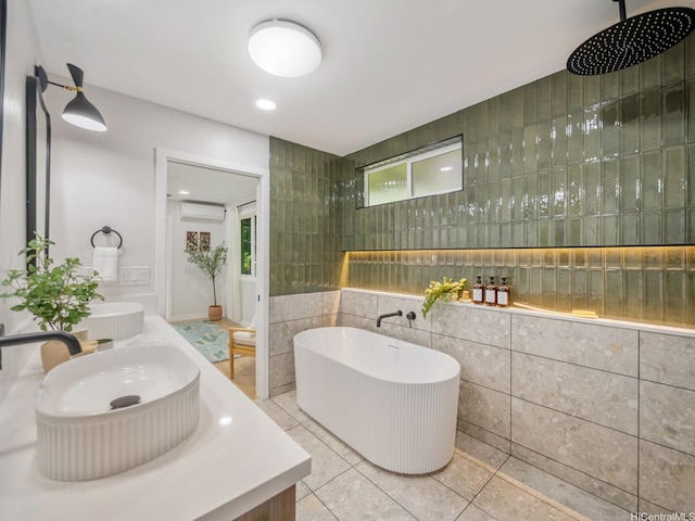 3641 Kumuone St, Honolulu, HI 96822 - full bathroom featuring a wall unit AC, double vanity, a soaking tub, tile patterned floors, and tile walls
