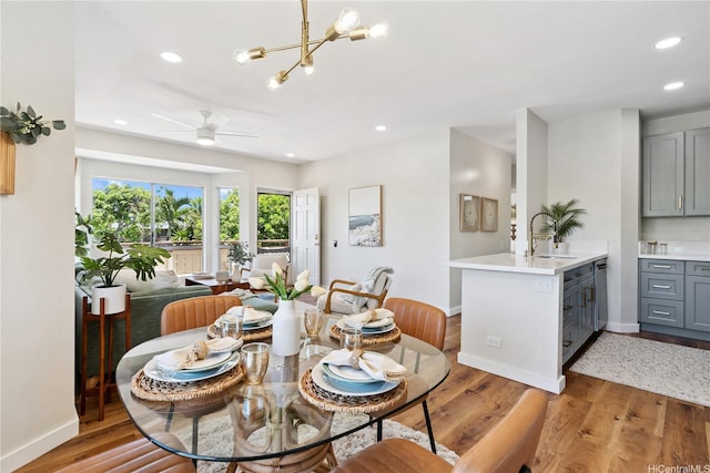 91-985 Puahala St Unit 42R, Ewa Beach, HI 96706 - dining space with recessed lighting, a ceiling fan, wood finished floors, and a chandelier