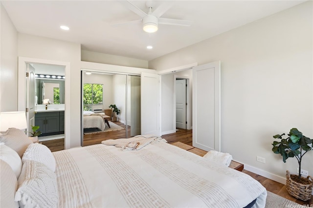 91-985 Puahala St Unit 42R, Ewa Beach, HI 96706 - bedroom featuring a closet, wood finished floors, recessed lighting, a ceiling fan, and ensuite bath