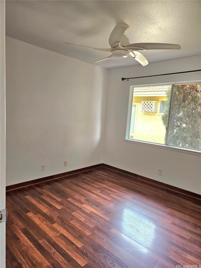 91-1040 Kanihaalilo St, Kapolei, HI 96707 - unfurnished room featuring dark wood-style flooring and ceiling fan