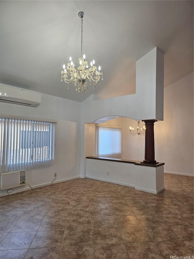 91-1040 Kanihaalilo St, Kapolei, HI 96707 - tiled empty room featuring a chandelier, an AC wall unit, high vaulted ceiling, and arched walkways