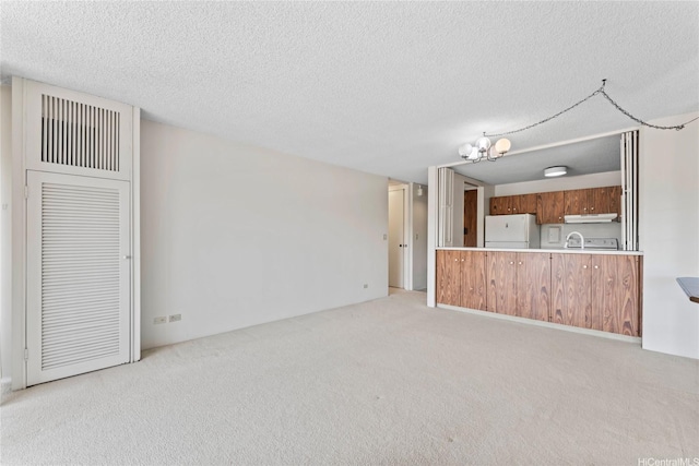 1717 Mott Smith Dr Unit 2212, Honolulu, HI 96822 - unfurnished living room with a textured ceiling and light colored carpet
