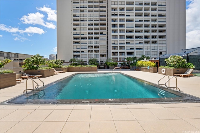 1717 Mott Smith Dr Unit 2212, Honolulu, HI 96822 - community pool featuring a patio area