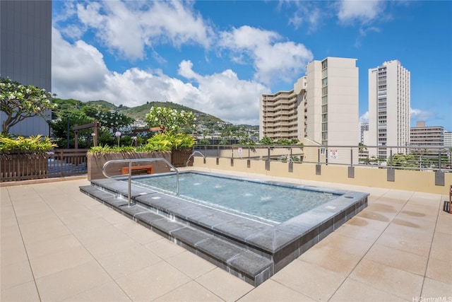 1717 Mott Smith Dr Unit 2212, Honolulu, HI 96822 - view of pool featuring a mountain view and a patio