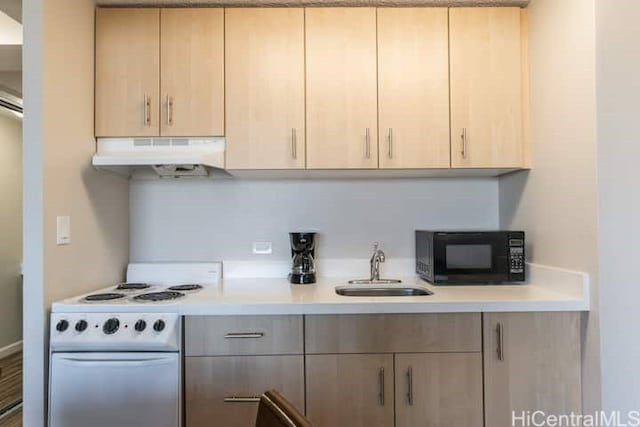 444 Niu St Unit 3608, Honolulu, HI 96815 - kitchen featuring under cabinet range hood, electric range, black microwave, and light countertops