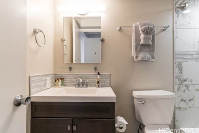 444 Niu St Unit 3608, Honolulu, HI 96815 - bathroom featuring vanity and tasteful backsplash