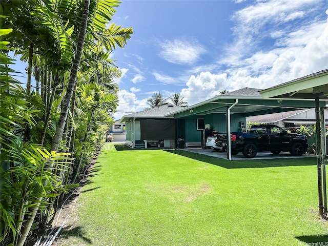 535 Maluniu Ave, Kailua, HI 96734 - view of green lawn with an attached carport
