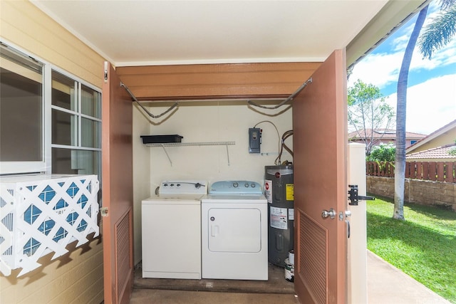 91-1093 Namahoe St Unit 5E, Kapolei, HI 96707 - laundry area with water heater and washing machine and clothes dryer