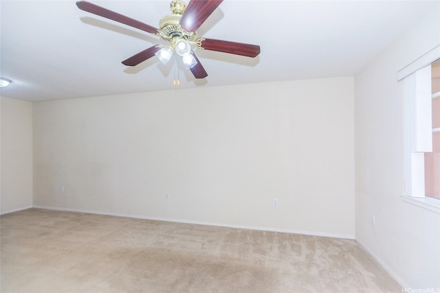 91-1093 Namahoe St Unit 5E, Kapolei, HI 96707 - empty room with light carpet and a ceiling fan