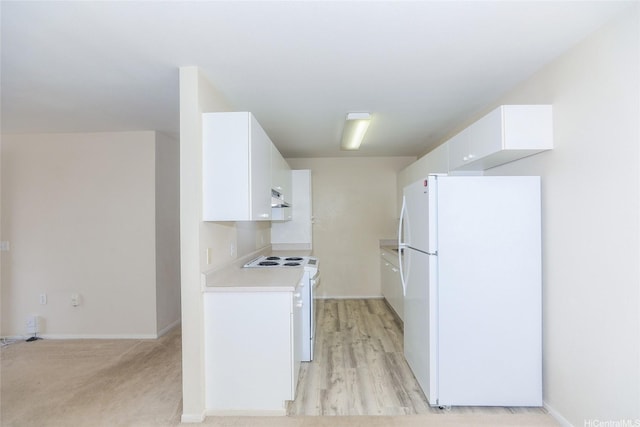 91-1093 Namahoe St Unit 5E, Kapolei, HI 96707 - kitchen featuring white appliances, under cabinet range hood, light countertops, white cabinetry, and light wood-type flooring