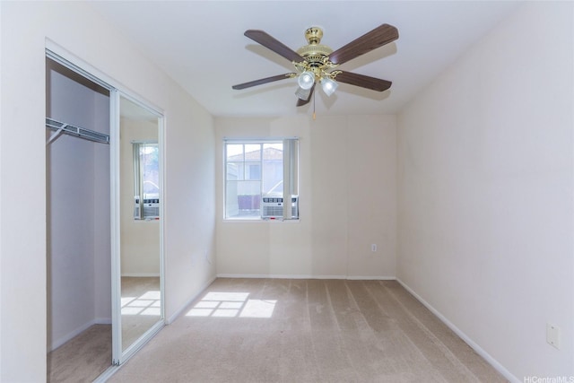 91-1093 Namahoe St Unit 5E, Kapolei, HI 96707 - unfurnished bedroom featuring carpet flooring, cooling unit, a ceiling fan, and a closet