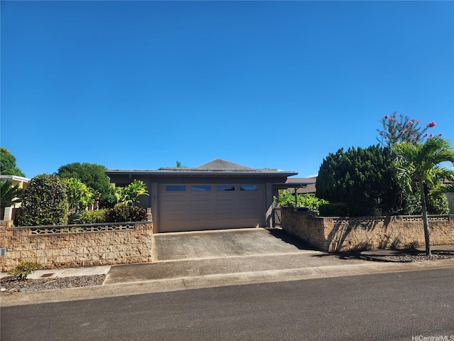 94-373 Leleaka St, Mililani, HI 96789 - view of front of home featuring driveway, an attached garage, and stucco siding