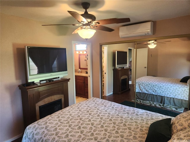 94-373 Leleaka St, Mililani, HI 96789 - bedroom featuring a wall unit AC, a fireplace, a ceiling fan, and a closet