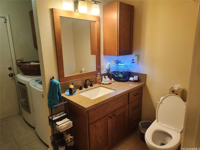 94-373 Leleaka St, Mililani, HI 96789 - bathroom featuring washer and clothes dryer, tile patterned flooring, and vanity