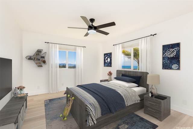 92-5056 Limukele St, Kapolei, HI 96707 - bedroom with light wood-type flooring and a ceiling fan