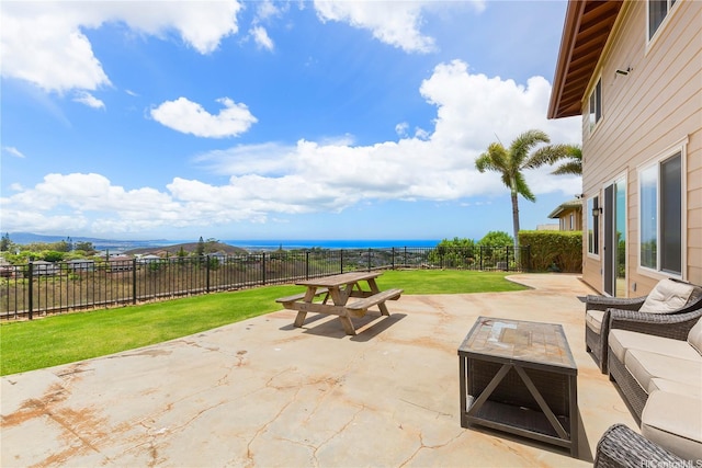 92-5056 Limukele St, Kapolei, HI 96707 - fenced backyard with a patio, an outdoor hangout area, and a water view