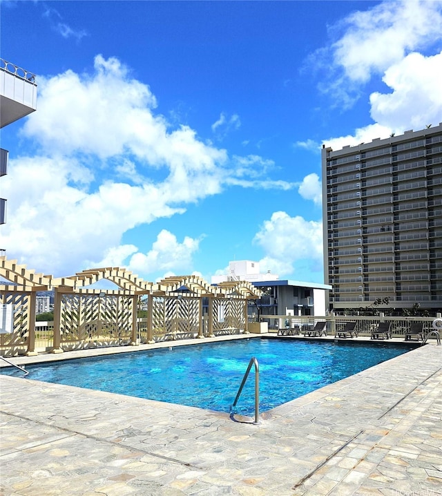 445 Seaside Ave Unit 2608, Honolulu, HI 96815 - community pool featuring a patio area