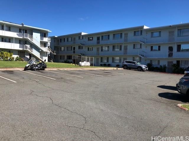 94010 Leolua St Unit 215, Waipahu, HI 96797 - view of apartment building / complex featuring uncovered parking
