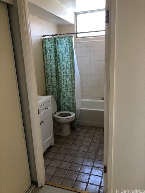 94010 Leolua St Unit 215, Waipahu, HI 96797 - bathroom featuring tile patterned floors, vanity, and shower / bath combination with curtain