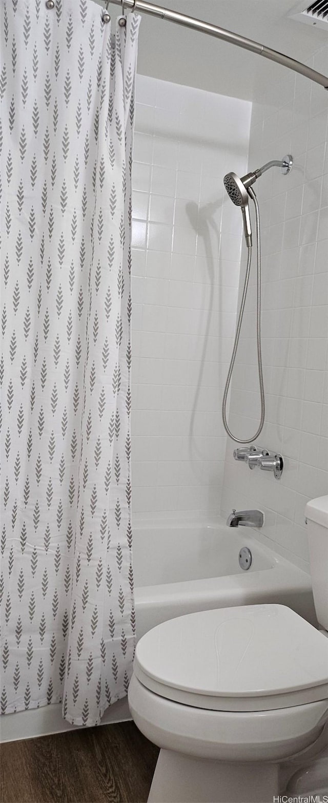 670 Prospect St Unit 606, Honolulu, HI 96813 - full bath with shower / bath combination with curtain and wood finished floors