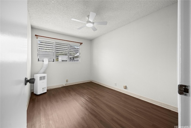 46-263 Kahuhipa St Unit B303, Kaneohe, HI 96744 - unfurnished room with dark wood-style floors, a textured ceiling, and ceiling fan