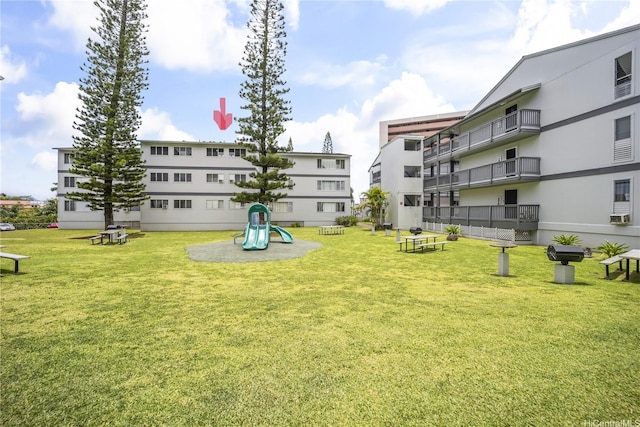 46-263 Kahuhipa St Unit B303, Kaneohe, HI 96744 - view of property's community featuring a yard