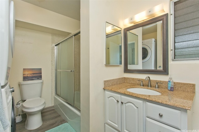 98-719 Iho Pl Unit 5-703, Aiea, HI 96701 - full bathroom featuring vanity, wood finished floors, and enclosed tub / shower combo