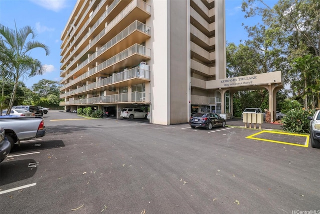 1830 Wilikina Dr Unit 602, Wahiawa, HI 96786 - view of building exterior with uncovered parking
