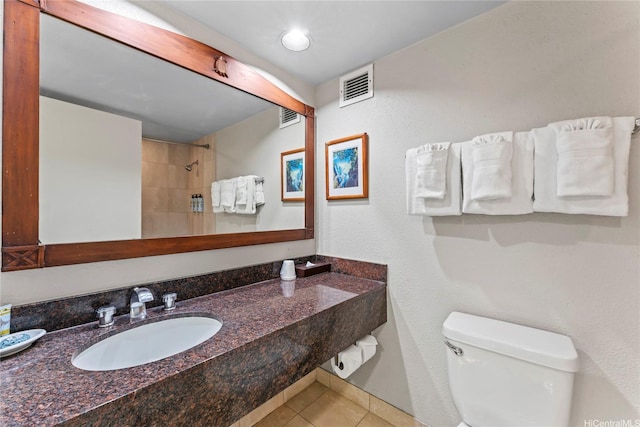 2045 Kalakaua Ave Unit 403, Honolulu, HI 96815 - bathroom with tile patterned flooring, a shower, and vanity