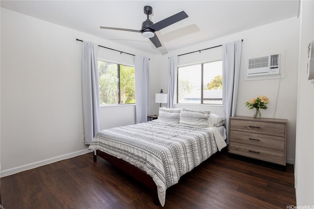 94-1010 Awalua St, Waipahu, HI 96797 - bedroom featuring dark wood-style flooring, ceiling fan, and an AC wall unit