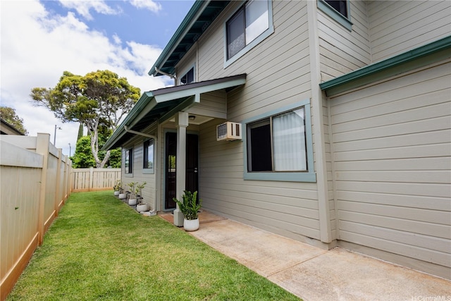 94-1010 Awalua St, Waipahu, HI 96797 - property entrance featuring a wall unit AC