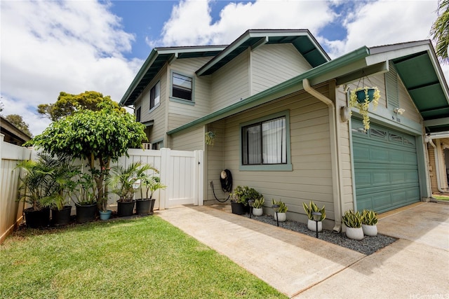 94-1010 Awalua St, Waipahu, HI 96797 - view of front of house featuring concrete driveway and an attached garage