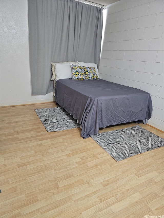 1702 Kewalo St Unit 204, Honolulu, HI 96822 - bedroom featuring wood finished floors and baseboards
