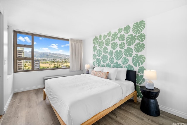 201 Oahu Ave Unit 1111, Honolulu, HI 96815 - bedroom featuring wood finished floors