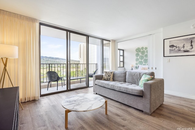 201 Oahu Ave Unit 1111, Honolulu, HI 96815 - living area with floor to ceiling windows and wood finished floors