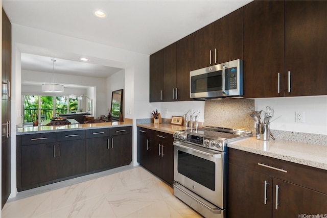437 Kailua Rd Unit 6107, Kailua, HI 96734 - kitchen with appliances with stainless steel finishes, light marble finish floors, light stone countertops, dark brown cabinetry, and recessed lighting