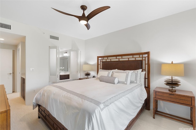 437 Kailua Rd Unit 6107, Kailua, HI 96734 - bedroom with light colored carpet, ensuite bathroom, and a ceiling fan