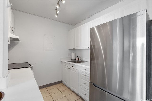 775 Kinalau Pl Unit 1806, Honolulu, HI 96813 - kitchen with freestanding refrigerator, light countertops, exhaust hood, and white cabinetry