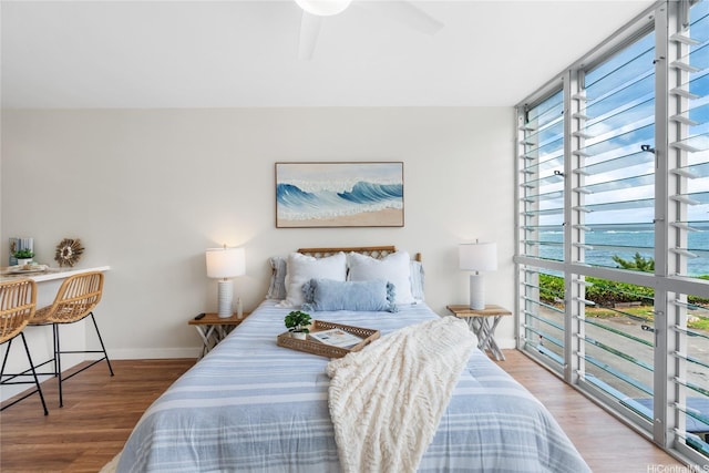 53-549 Kamehameha Hwy Unit 313, Hauula, HI 96717 - bedroom with wood finished floors and ceiling fan