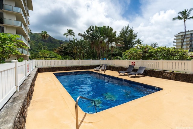 53-549 Kamehameha Hwy Unit 313, Hauula, HI 96717 - view of pool with a patio area and a fenced backyard