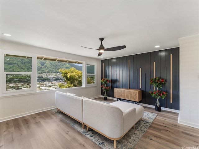 3063 Woolsey Pl, Honolulu, HI 96822 - living room with a ceiling fan, recessed lighting, wood finished floors, and a decorative wall