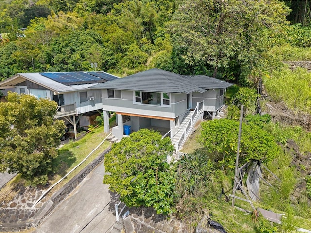 3063 Woolsey Pl, Honolulu, HI 96822 - aerial view of property and surrounding area with a forest