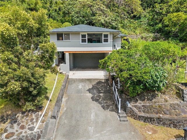 3063 Woolsey Pl, Honolulu, HI 96822 - view of front of property featuring a wooded view