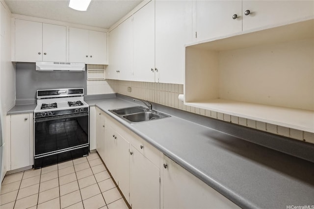 1605 Pensacola St Unit 104, Honolulu, HI 96822 - kitchen featuring gas range, under cabinet range hood, white cabinetry, light tile patterned flooring, and light countertops